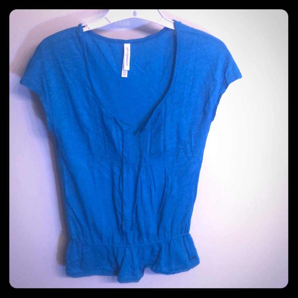 Turquoise t shirt with string tie